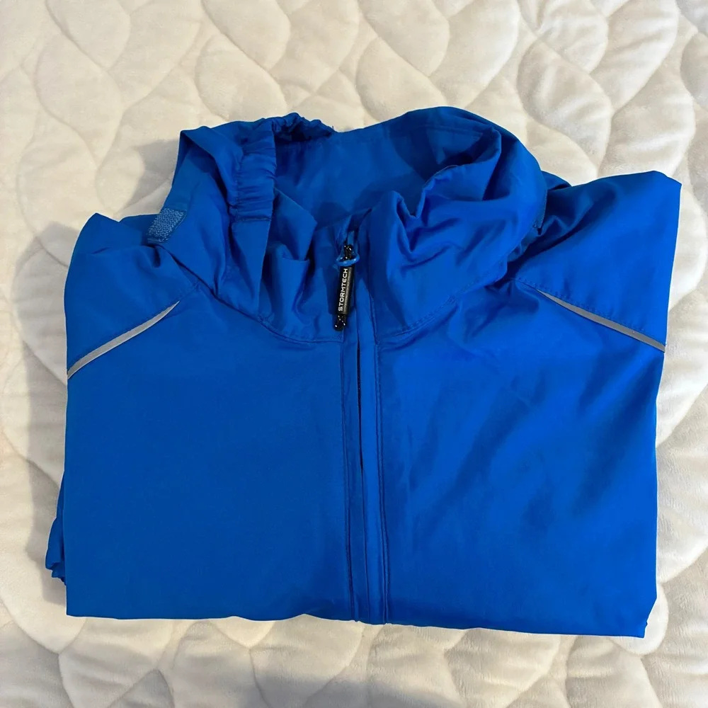 Stormtech Performance Rain Jacket‎ Lightweight Hooded Reflective Blue YL/JG
